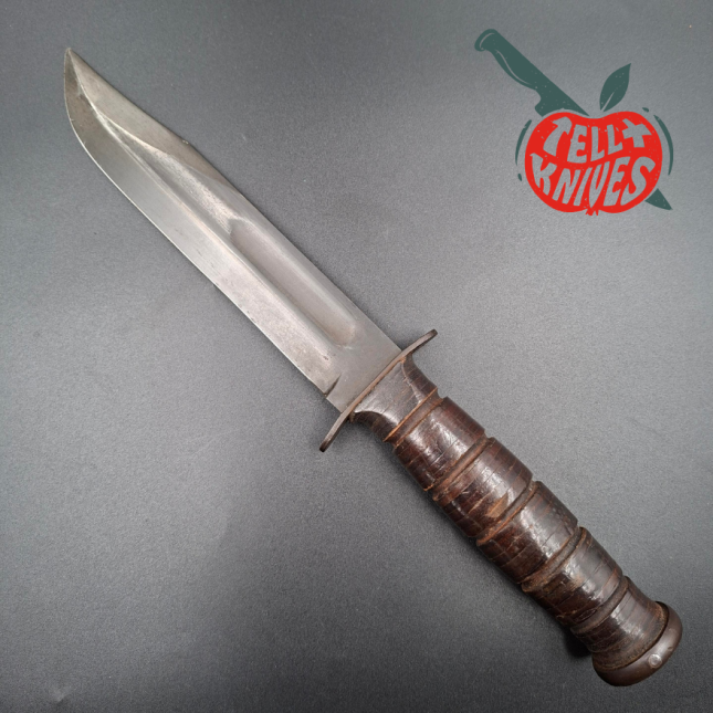 KABAR MK2 Fighting Knife WWII Era black carbon steel blade stacked leather handle gray plastic sheath