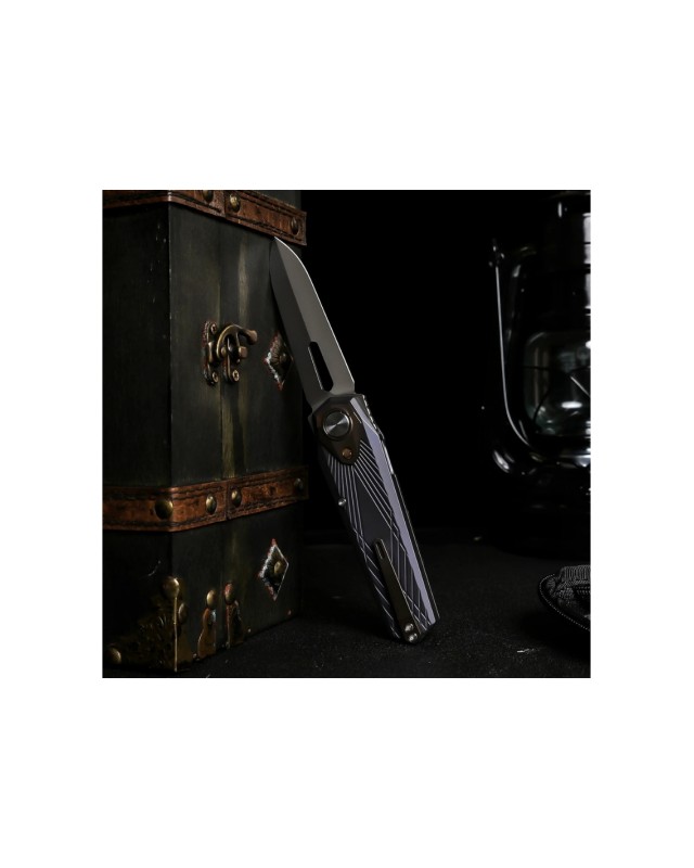 Remette Infinite Power  M390 steel stonewash finish blade grey and gold titanium handle Dagger blade Swiss Legal