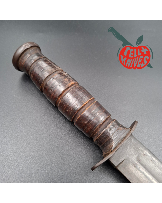 KABAR MK2 Fighting Knife WWII Era black carbon steel blade stacked leather handle gray plastic sheath