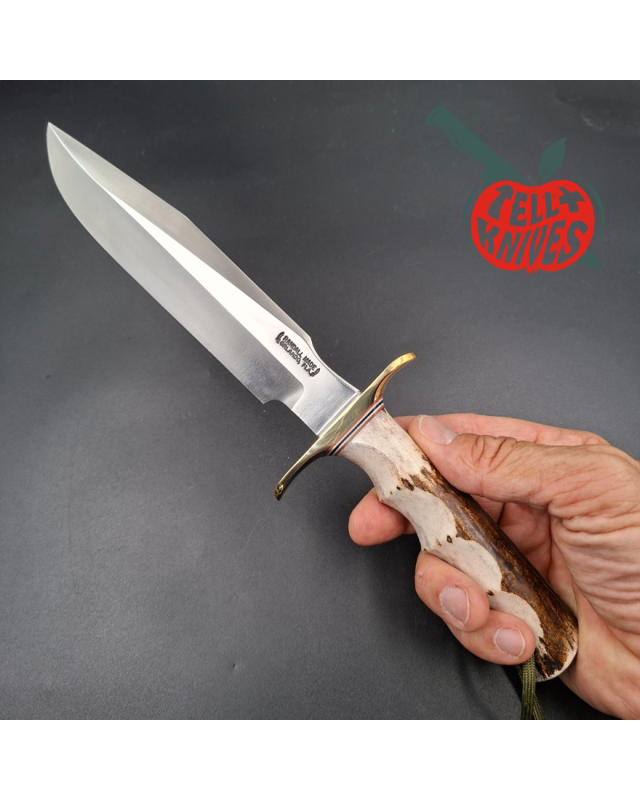 Randall Made Knives Model 1-7: forged carbon steel blade, brass guard, four-finger grip, stag handle