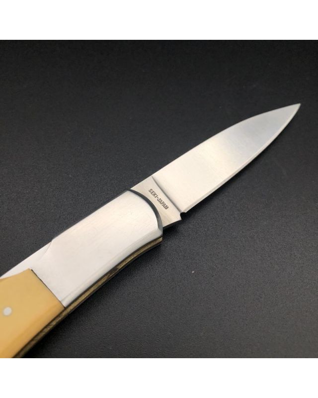 Al Mar Hawk 1002 - yellow micarta (Vintage années 80)