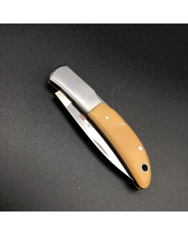 Al Mar Hawk 1002 - yellow micarta (Vintage années 80)