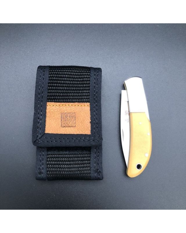 Al Mar Hawk 1002 - yellow micarta (Vintage années 80)