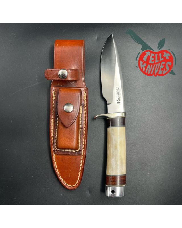 Vintage 80ies Model 25-5 Trapper stainless steel blade bone and stacked leather handle brown leather sheath with stone