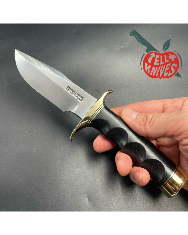 Model 23 Gamemaster forged carbon steel black micarta 4 finger grips handle brass guard and pommel brown leather sheath